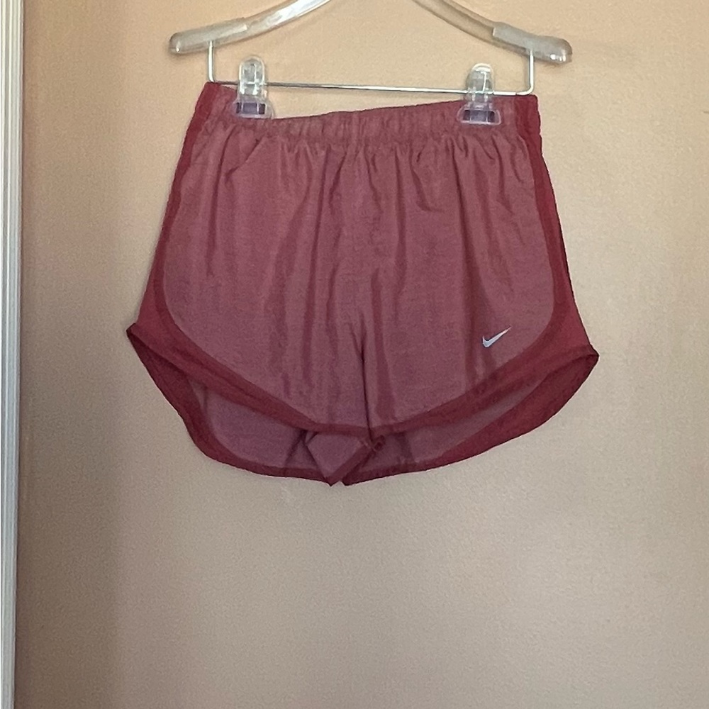 Nike dri-fit woman’s shorts. Size medium. Salmon colored.